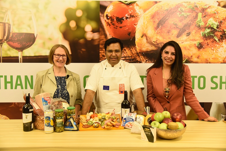 Chef Ajay Chopra, Campaign Ambassador, More Than Food with a board full of European flavours