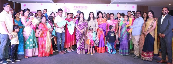 Dr Sreevani Kotha (center), Clinical Head & Sr. Consultant Fertility Specialist, Oasis Fertility, Dilsukhnagar; with parents who conceived successfully at Oasis Fertility, Dilsukhnagar; at the 7th Anniversary celebrations of Oasis Fertility, Dilsukhnagar, today at Minerva Blue Fox Banquets, at Kothapet.