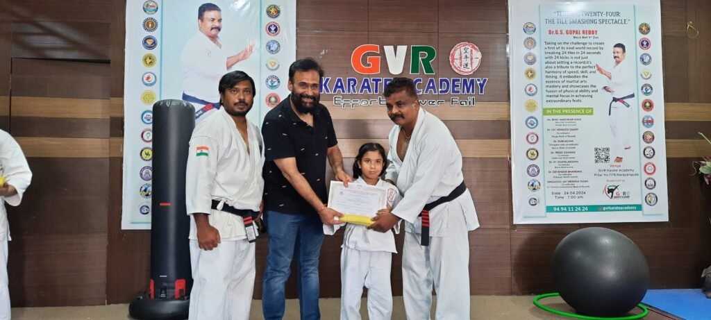 Senior Karate Master Radheshyam Tiwari seen giving away certificates to winners--pic 2