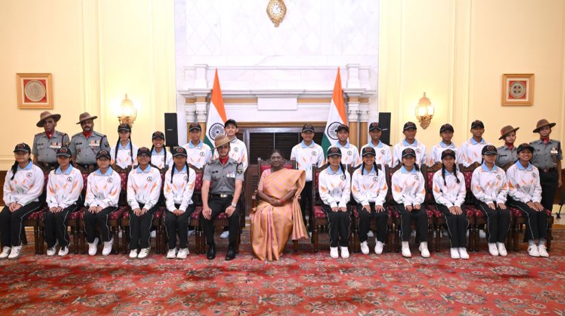 Group photo with flags and uniforms. Students from Manipur Visit Rashtrapati Bhavan: A National Integration Tour